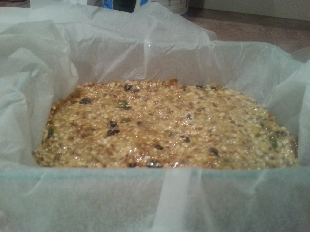 Protein Bar Recipe: Smooth out mixture onto baking tray or pyrex like I did (press down really firm!!)