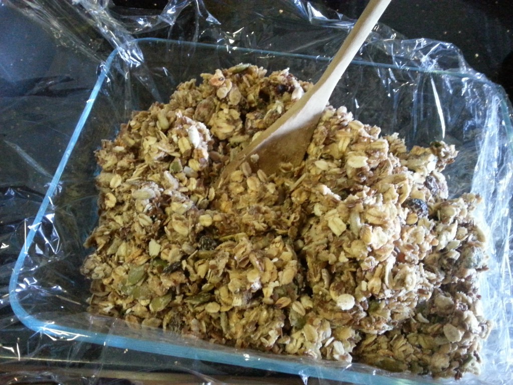 Clean Eating Muesli Bars Recipe: Poor mixture into baking dish and press down FIRMLY